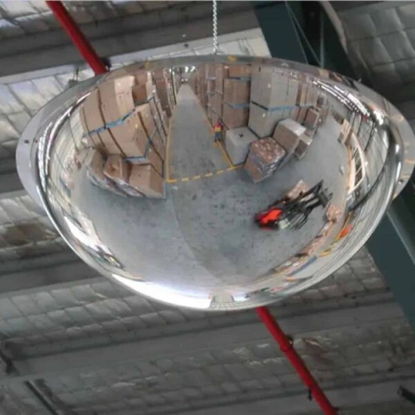 large full dome mirror hanging in warehouse office