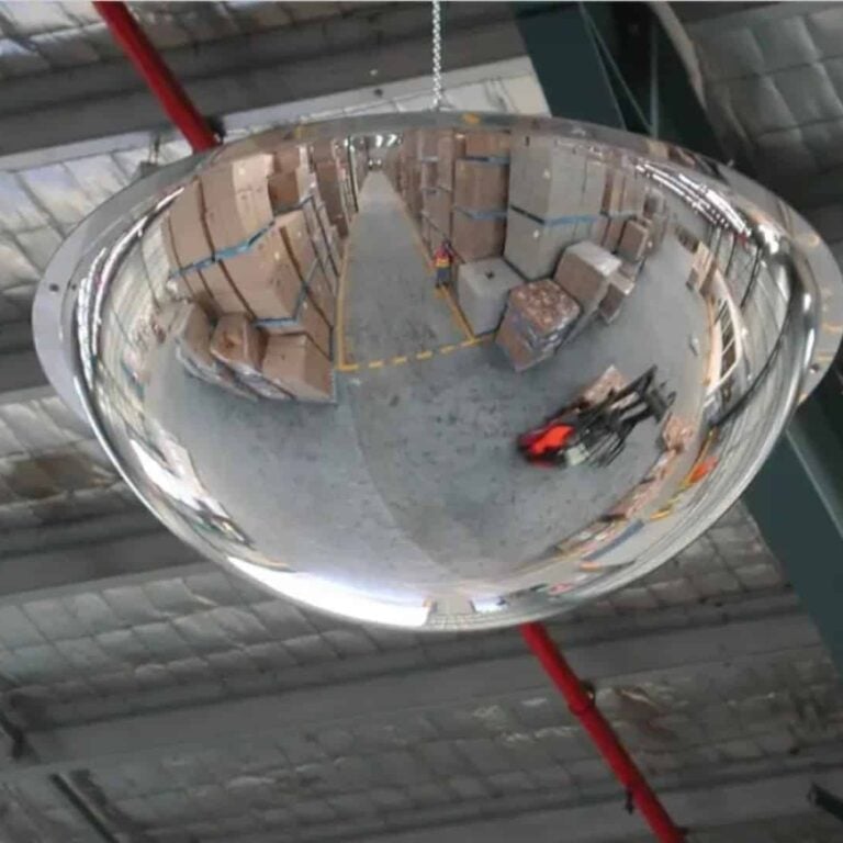 large full dome mirror hanging in warehouse office